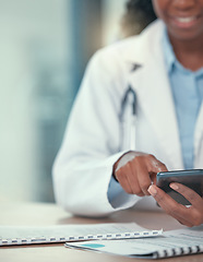 Image showing Phone, doctor and hands of black woman texting for telehealth, healthcare or research in hospital. Smartphone, medical professional or happy person with online consultation, reading email or wellness