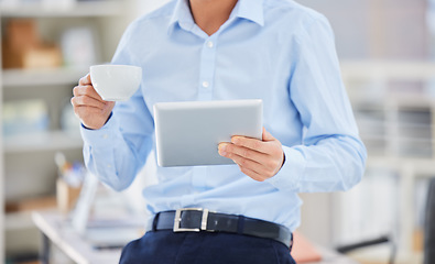 Image showing Closeup, business and man with a tablet, planning and search internet with entrepreneur, online reading and break with coffee. Male person, employee or consultant with technology, tea or website info