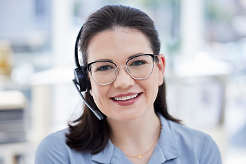 Image showing Consultant, portrait of woman call center agent and with headset at her workplace office with smile. Customer service or telemarketing, support or online communication and female person for crm