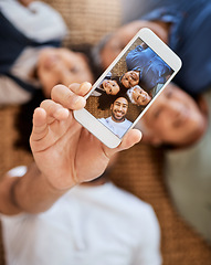 Image showing Happy family, phone screen and selfie for social media, online post or vlog on floor together at home. Top view of Grandparents, father and child smile for photo, memory or profile picture in house