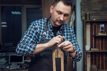 Image showing Concept of handmade craft production of leather goods.