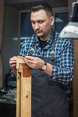 Image showing Concept of handmade craft production of leather goods.