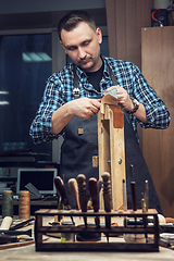 Image showing Concept of handmade craft production of leather goods.