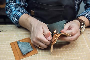 Image showing Concept of handmade craft production of leather goods.