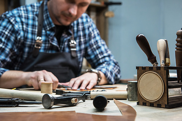 Image showing Concept of handmade craft production of leather goods.