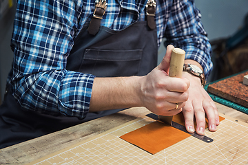 Image showing Concept of handmade craft production of leather goods.