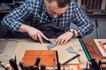 Image showing Concept of handmade craft production of leather goods.