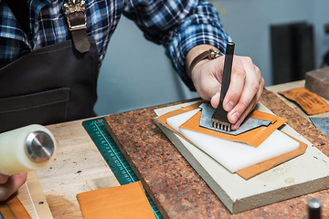 Image showing Concept of handmade craft production of leather goods.