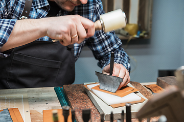 Image showing Concept of handmade craft production of leather goods.