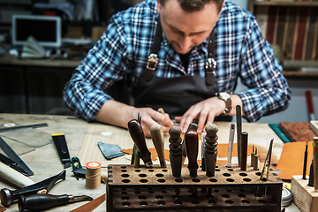 Image showing Concept of handmade craft production of leather goods.