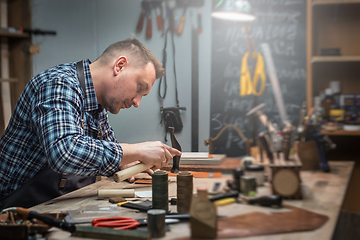 Image showing Concept of handmade craft production of leather goods.