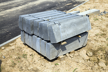 Image showing large and long concrete curbs