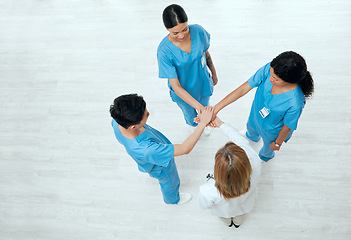 Image showing Above, teamwork or hands of nurses in collaboration in meeting for healthcare, targets or goals. About us, team building or top view of medical doctors with group support, motivation or mission