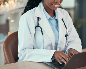 Image showing Laptop, doctor and hands of woman typing for research, healthcare or telehealth in hospital. Computer, medical professional and happy person with online consultation, reading email and wellness