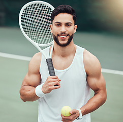 Image showing Portrait of happy man with racket, tennis ball and smile, fitness mindset and confidence for game on court. Workout goals, pride and happiness, male athlete with motivation for health and wellness.