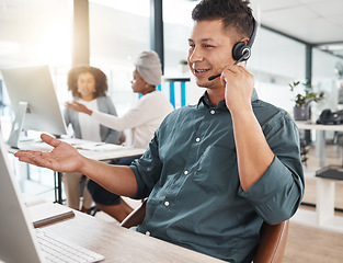 Image showing Smile, call center and man listening on computer for telemarketing, customer service and support. Crm, contact us and sales agent, consultant or employee working at help desk, consulting and business