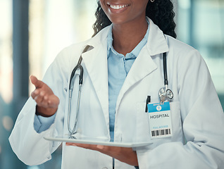 Image showing Closeup, doctor and black woman with a digital tablet, healthcare and connection with innovation, hospital and network. Female person, medical professional and employee with technology and research