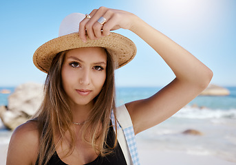 Image showing Woman, portrait at beach with travel and summer tropical vacation in Mexico with tourism and adventure. Female person is calm outdoor, relax on holiday with journey and nature, sun and sea waves