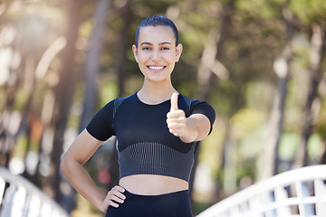 Image showing Runner, portrait or happy woman with thumbs up in park for fitness training with positive mindset or smile. Motivation, workout or personal trainer with like sign, hand gesture or thumb up in nature