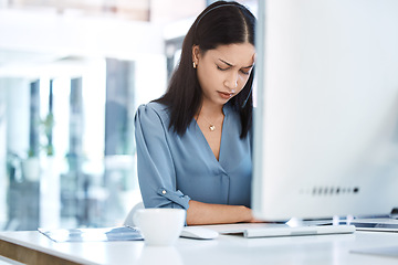 Image showing Call center, stress and woman with headache, problem or crisis, internet or issue in office. Burnout, migraine and lady consultant with anxiety, glitch or online mistake while consulting crm or faq