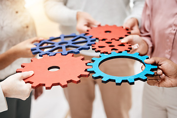 Image showing Professional, group and hands with gears for a collaboration in a meeting for support at a company. Teamwork, strategy and corporate employees with a partnership for a common goal for a project.