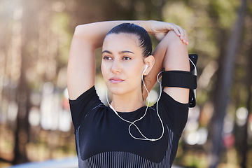 Image showing Music, woman thinking or runner stretching arms for workout, body movement or relaxing on break. Podcast, radio or healthy girl athlete in fitness training warm up for flexibility or mobility in park