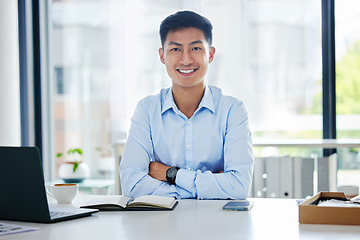 Image showing Portrait, business and Asian man with arms crossed, laptop and confident consultant in a workplace, smile and career. Face, male person or employee with a pc, technology or notebook with professional