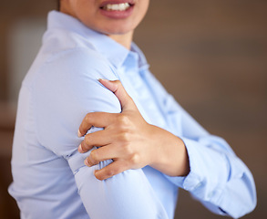 Image showing Professional woman with shoulder pain, hand on injury and closeup with medical problem, muscle tension and hurt. Health, wellness and tired joint, female worker with healthcare issue and inflammation