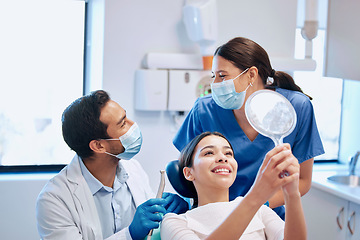 Image showing Dentist, mirror and woman with smile for teeth whitening, braces and dental consultation. Healthcare, dentistry and happy female patient with orthodontist for oral hygiene, wellness and cleaning