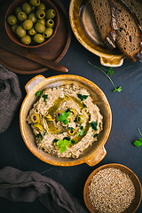 Image showing Traditional arabian eggplant dip (baba ganoush) on rustic dark t