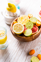 Image showing Preparing refreshing summer drinks and lemonade with fruits and berries