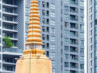 Image showing Golden pagoda and modern condo in Bangkok, Thailand