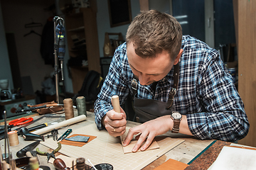 Image showing Concept of handmade craft production of leather goods.