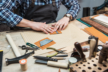 Image showing Concept of handmade craft production of leather goods.