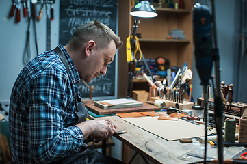 Image showing Concept of handmade craft production of leather goods.