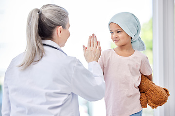 Image showing Cancer, high five and doctor with kid support, healthcare service and success or empathy, courage and healing in hospital. Girl or sick kid and pediatrician or medical woman helping or hands together