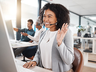 Image showing Consultant, woman call center agent with headset and computer at her desk in a modern workplace office with a lens flare. Telemarketing, online communication or customer service and African female