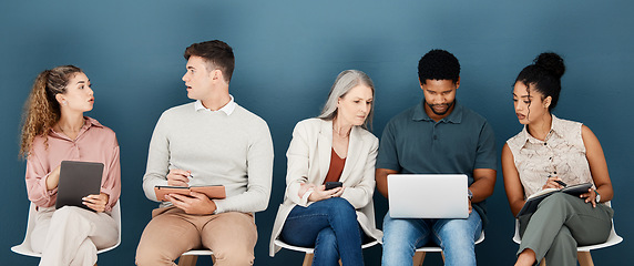 Image showing Laptop, phone and business people waiting for job interview, vacancy and career opportunity in office. Technology, diversity and men and women candidates for hr meeting, recruitment and employment