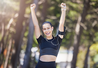 Image showing Winner, runner or portrait of happy woman in park with hands in the air for winning celebration. Goal motivation, nature or excited sports girl in running training for achievement or fitness success