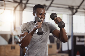 Image showing Dumbbells, exercise and a happy black man at gym for fitness, training workout and strong muscle. African athlete or bodybuilder person with weights for power, biceps and focus at a wellness club