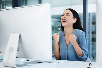 Image showing Happy woman, call center and fist in celebration for winning, bonus or sales promotion at office. Excited female person, consultant or agent in joy for win, victory or customer service at workplace