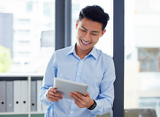 Image showing Tablet, reading and happy business man, accountant or professional employee in office, online management and app. Digital report, financial review and happy asian person in workplace on technology