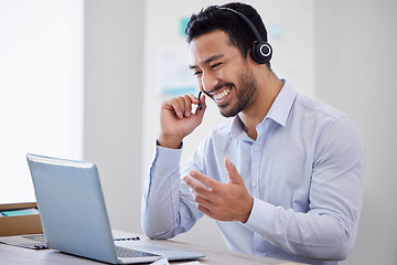 Image showing Call center, laptop or happy man consulting on video call via headset in customer services help desk. Smile, telemarketing virtual assistant or funny Asian sales consultant laughing or talking online