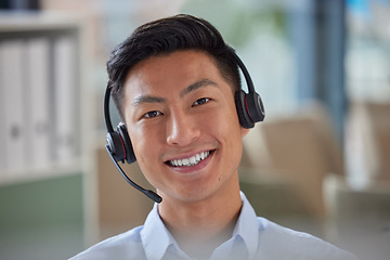 Image showing Call center, happy and portrait of business man in office for consulting, contact us or telemarketing. Secretary, customer service or help desk with face of Asian employee for receptionist and advice