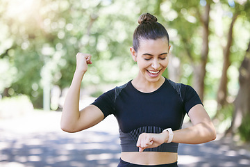 Image showing Success happy woman or runner with smartwatch in park for heart rate to monitor training or exercise progress. Excited, yes or healthy sports athlete with timer celebrates running workout or fitness