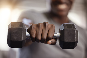 Image showing Dumbbells, hand and exercise closeup at gym for fitness, training workout and strong muscle. Athlete or bodybuilder person with a fist and iron weights for power and performance at a wellness club