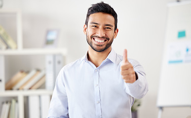 Image showing Thank you, portrait of businessman with thumbs up and in office happy at his modern workplace. Success or achievement, motivation and cheerful male person with a hand emoji for support or deal