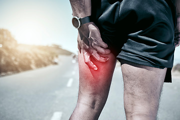 Image showing Fitness, hamstring and injury with a sports man holding his muscle in pain while outdoor for a workout. Exercise, anatomy and accident with a male athlete feeling sore while training for recreation