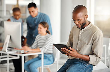 Image showing Business tablet, smile and black man, designer or creative in office workplace. Touchscreen, technology and African male professional on email app, graphic design research or reading website online.