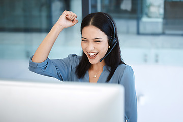 Image showing Happy woman, call center and fist in celebration for promotion, success or winning bonus at office. Excited female person, consultant or agent in joy for win, victory or customer service at workplace